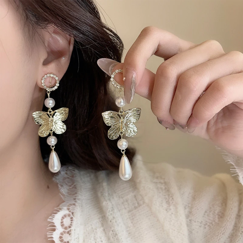合金耳饰 甜酷风金色蝴蝶水滴长款耳钉无痛气质独特蚊香盘耳夹女