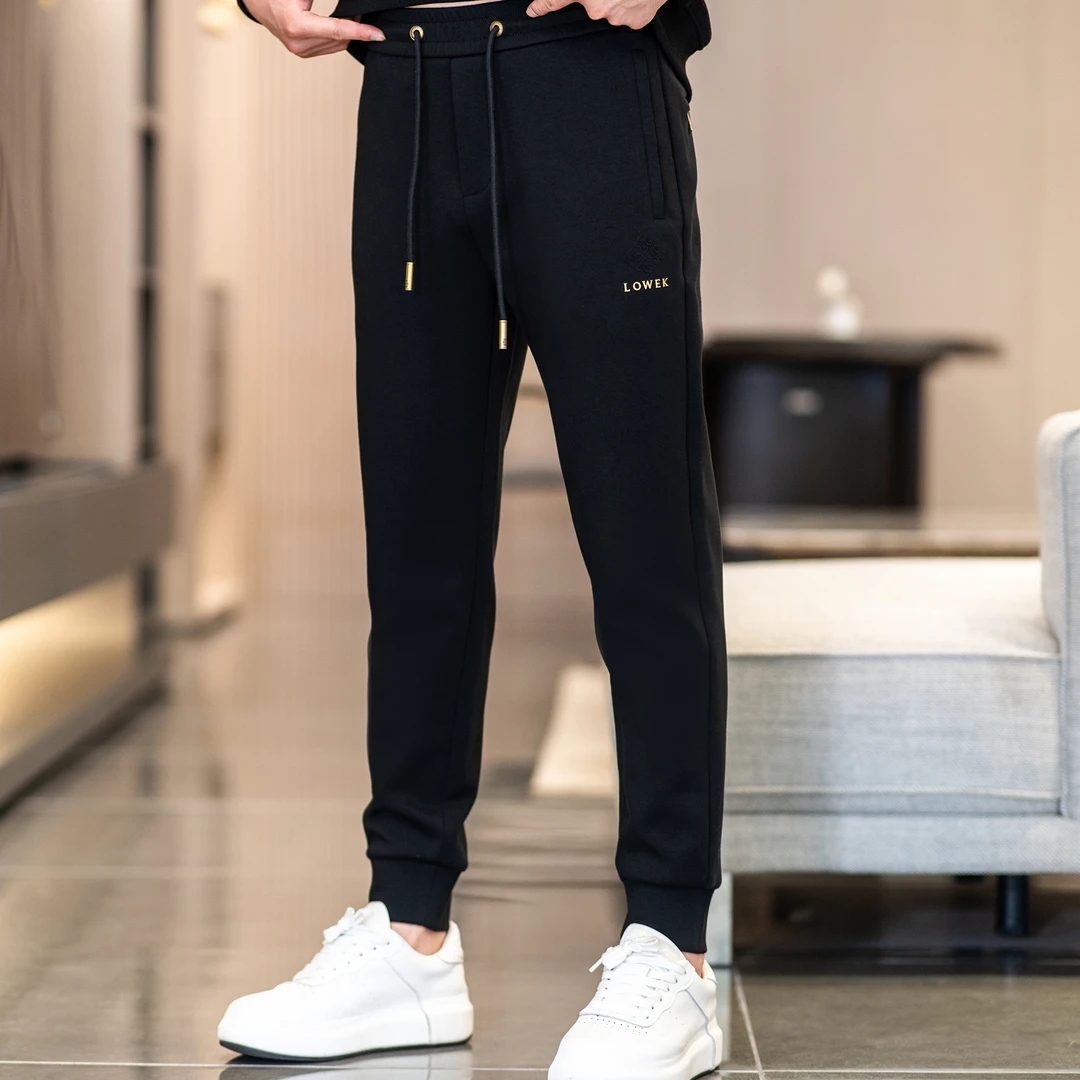 2128/香港轻奢品牌冬季新款弹力休闲裤加绒加厚运动直时尚百搭