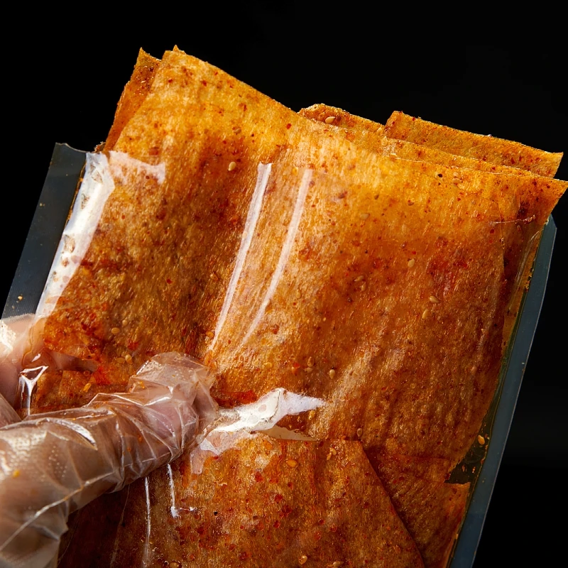 湖南特产平江大辣片手撕豆皮网红零食麻辣豆腐干香辣辣条开袋即食