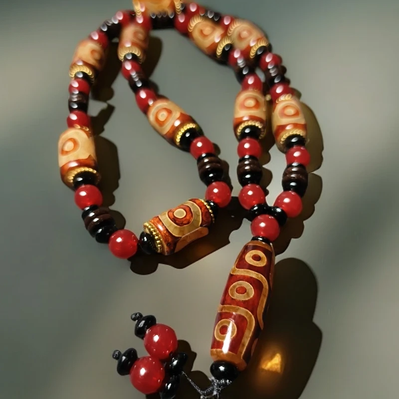 九眼天珠，红皮老料，搭配三眼藏天珠全珠链条