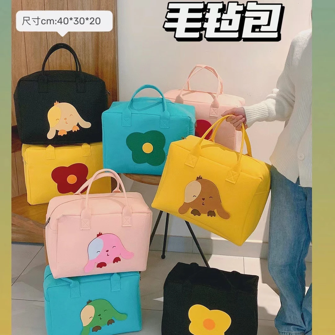 福利爆款收纳包大容量多功能实用便携出游通勤卡通收纳整理毛毡包