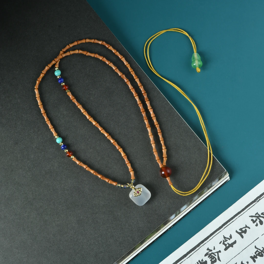 橄榄核竹节脖挂无事牌款