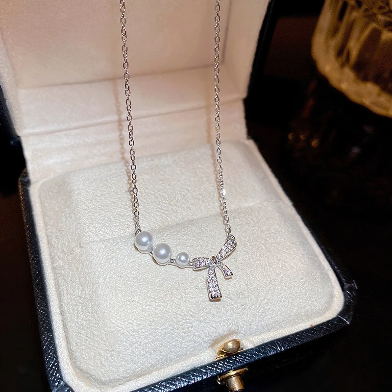 钛钢项链 蝴蝶结珠珠项链女款饰品轻奢气质小众高级感锁骨链百搭