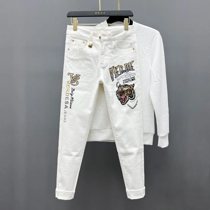 2023欧货潮牌网红修身小脚白色牛仔裤男士时尚个性虎头刺绣长裤潮