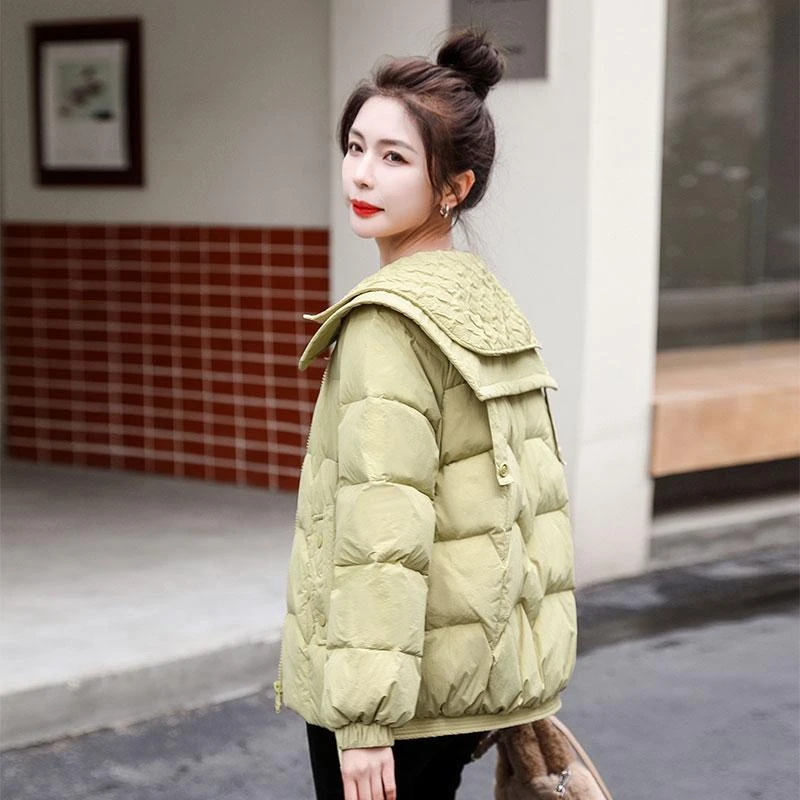羽绒服女短款加厚冬装2024年新款时尚减龄娃娃领青绿色白鸭绒外套