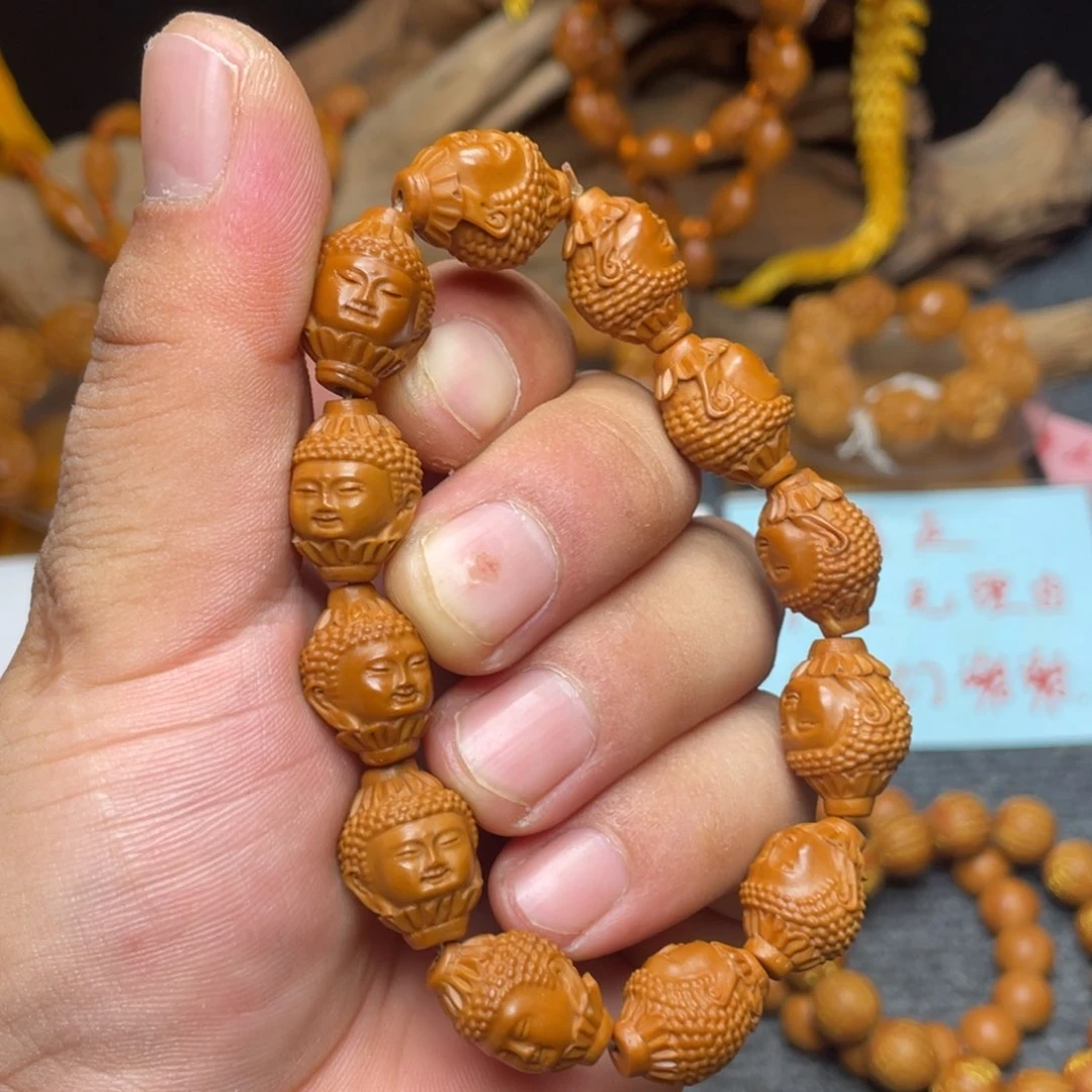 橄榄核核雕小日如来