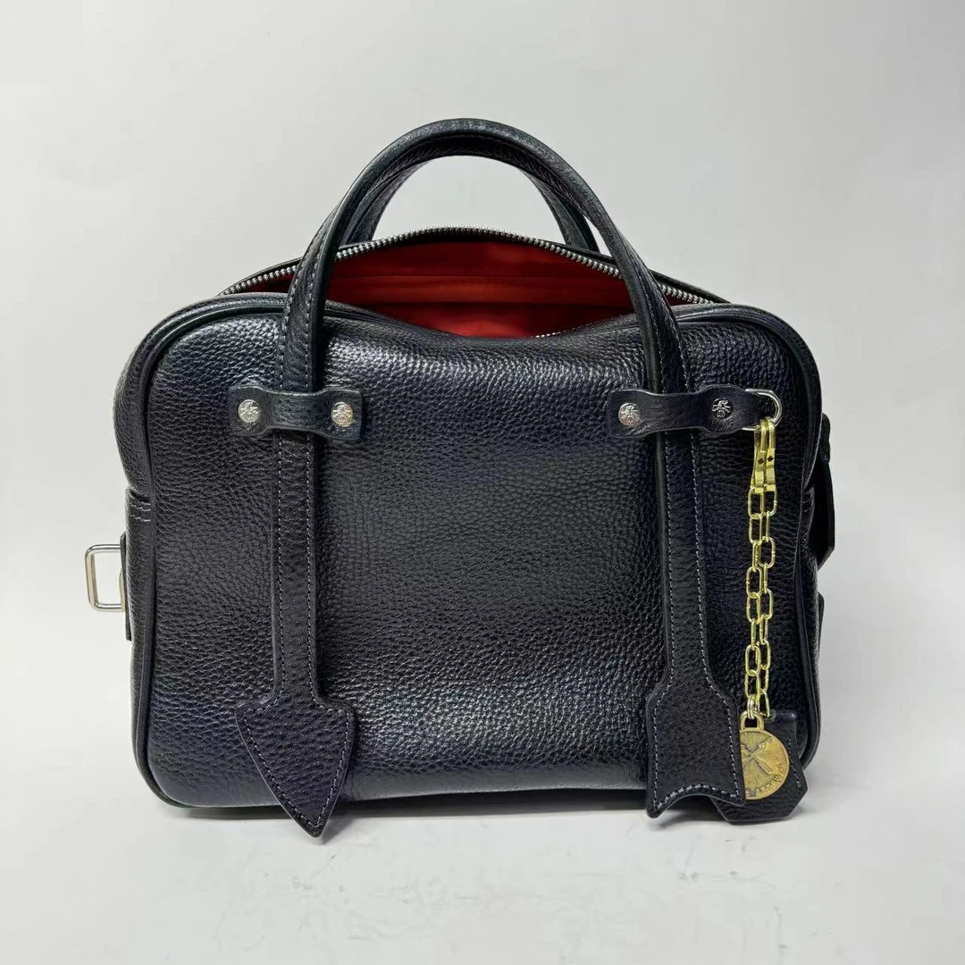 雷鸟皮具美式复古头层牛皮保龄球手提包14寸电脑包时尚腋下包0911