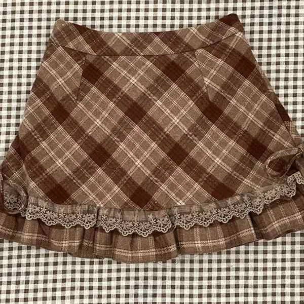 今年流行爆款复古格纹半身裙女秋冬季甜辣妹设计感洋气高腰短裙子