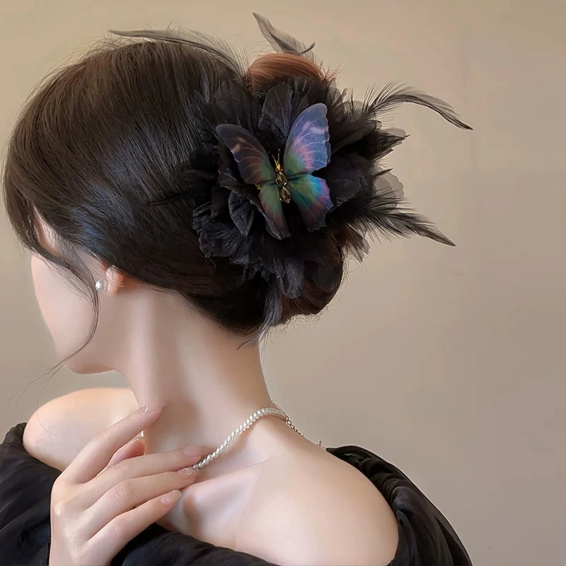 蓝色蝴蝶羽毛发夹2024新款黑色高端抓夹夏天夹子头饰发饰