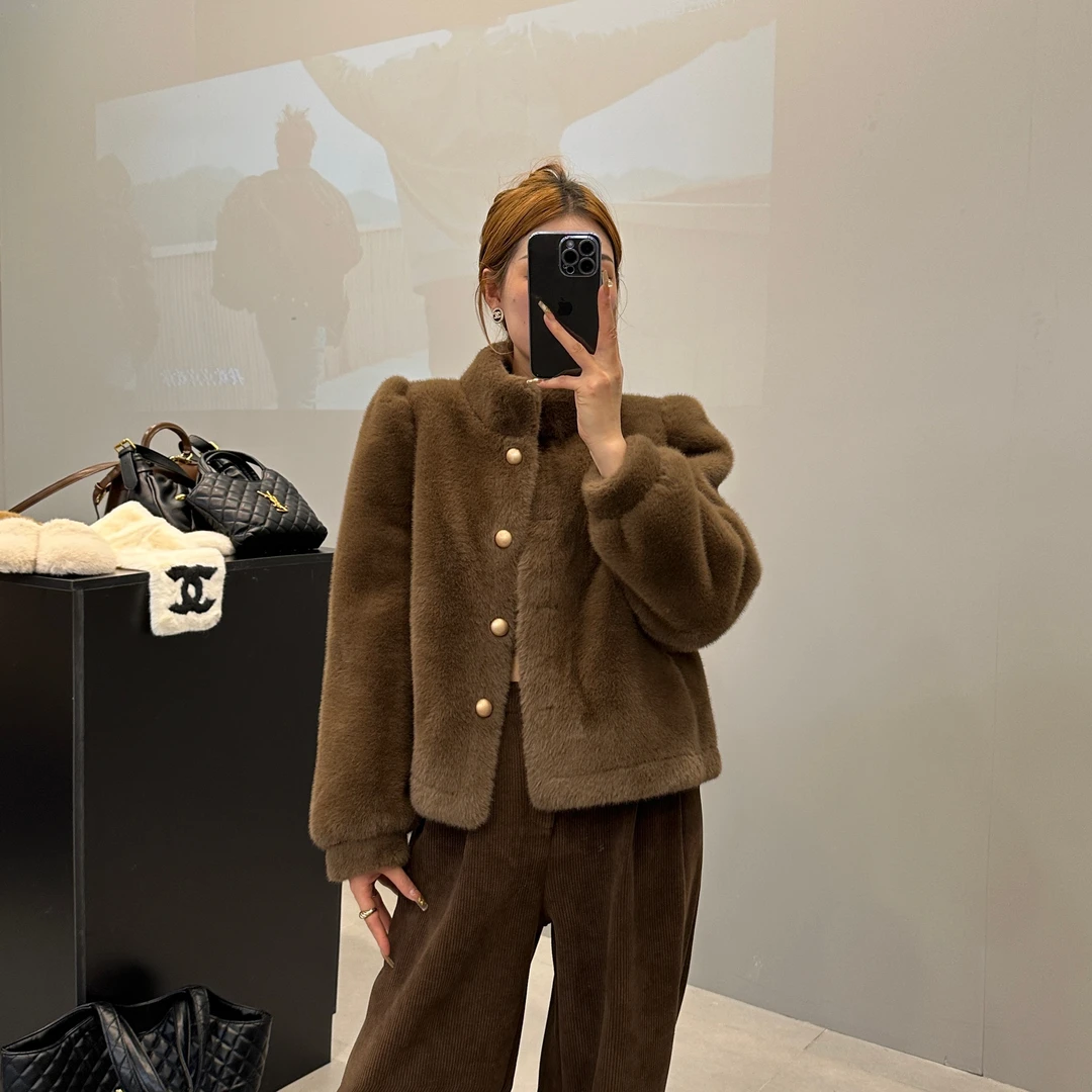 东大门冬装气质时尚百搭设计师皮毛一体灯笼袖毛毛短款外套