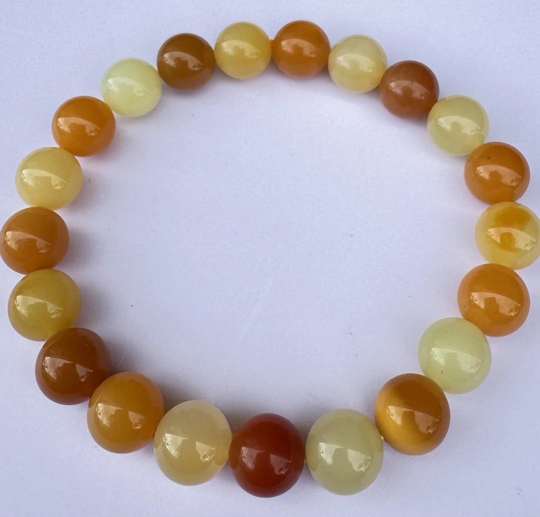 缅黄多宝彩色高品质卡9-卡10手串原石手工打磨