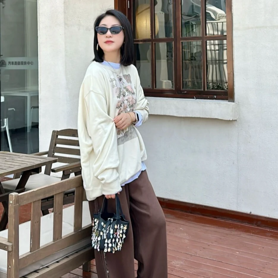 24秋季新款卡通渐变图案印花宽松圆领长袖卫衣女