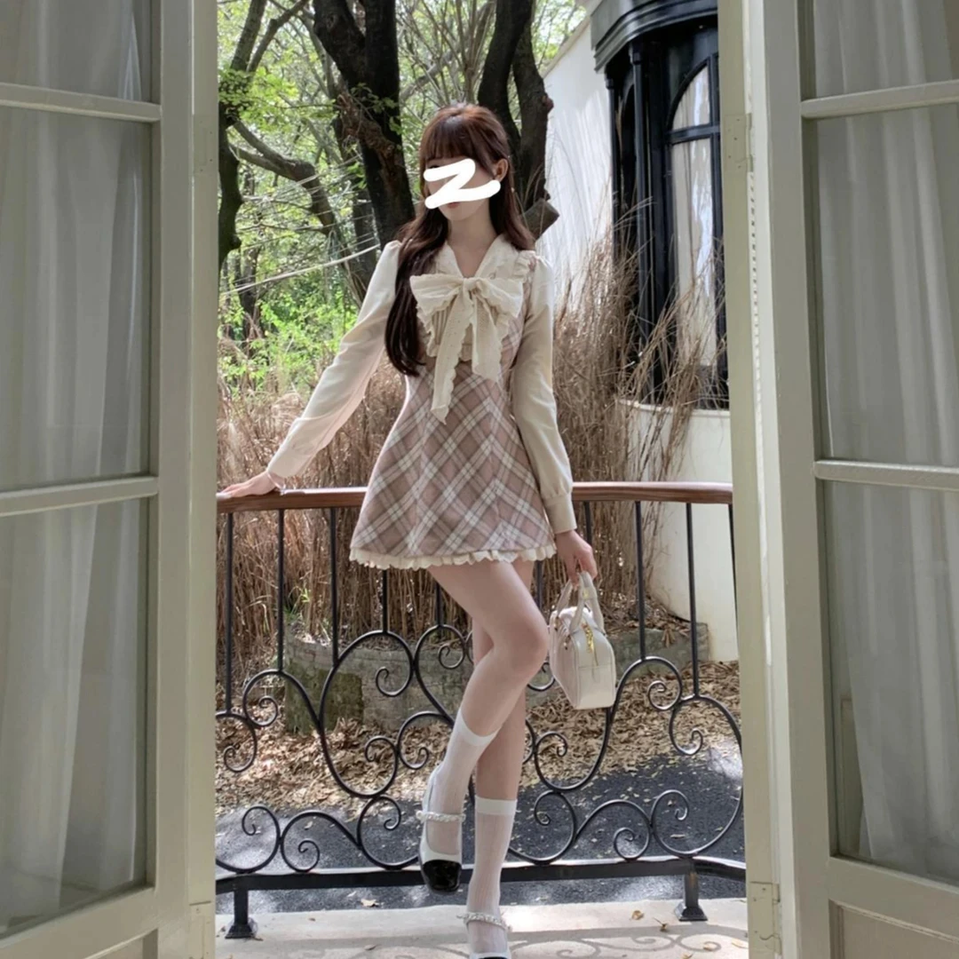 T06富家千金衣服高级感甜美减龄蝴蝶结格纹约会洋气裙2025春季款
