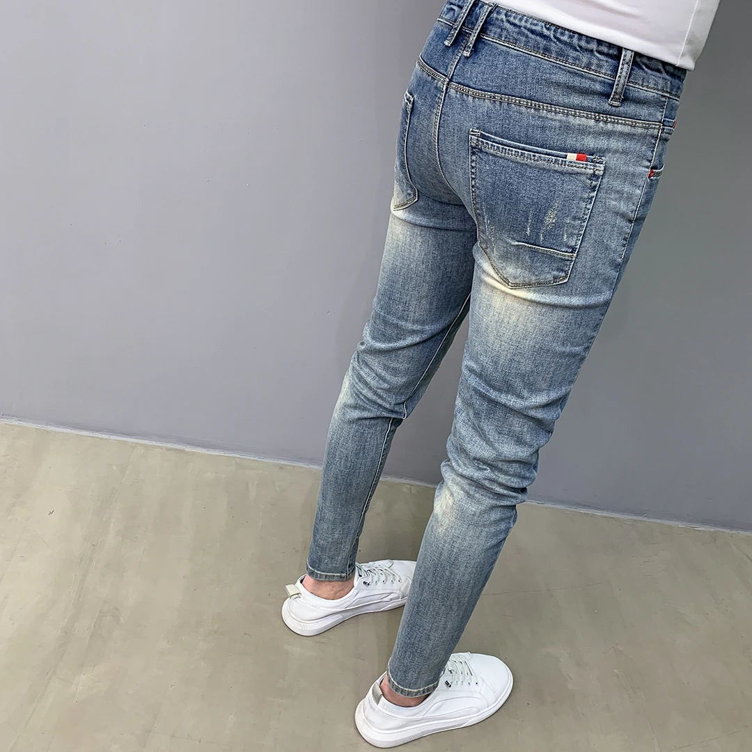 2025新款水洗蓝色牛仔裤男潮流简约九分休闲韩版修身小脚百搭长裤