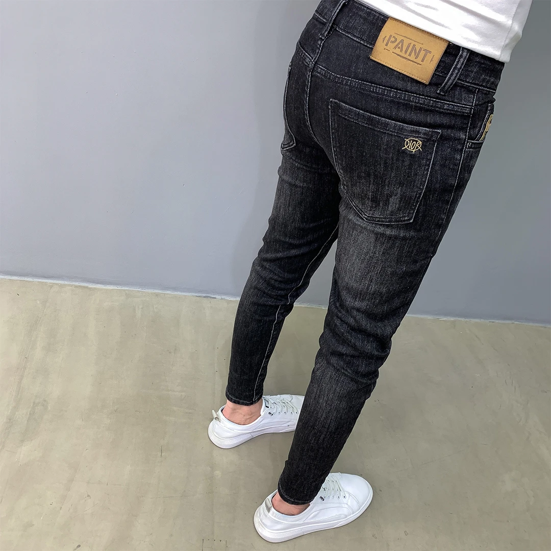 高端黑色牛仔裤男新款韩版弹力显瘦九分2025潮牌百搭修身小脚长裤