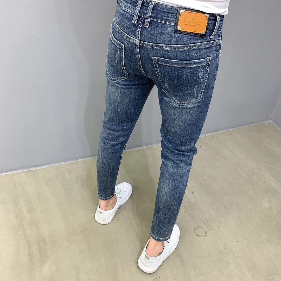 做旧蓝色九分破洞牛仔裤男2025新款潮流水洗修身弹力百搭小脚裤