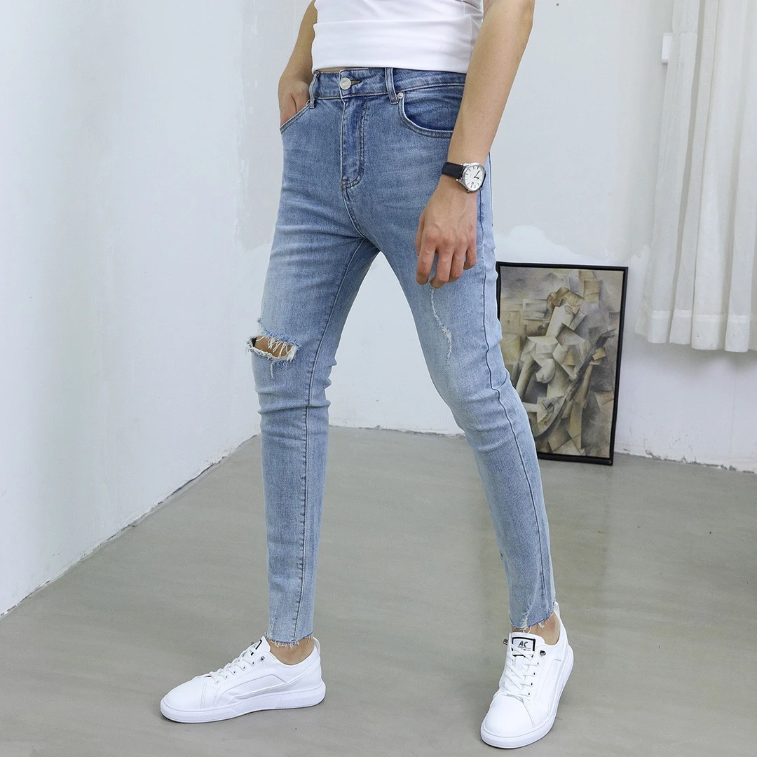 新款浅蓝色牛仔裤男百搭韩版显瘦修身小脚潮流毛边破洞个性九分裤