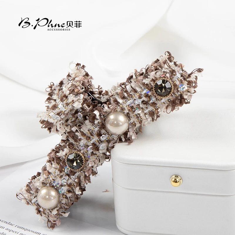 B.【贝菲新品】饶布珠珠抓夹