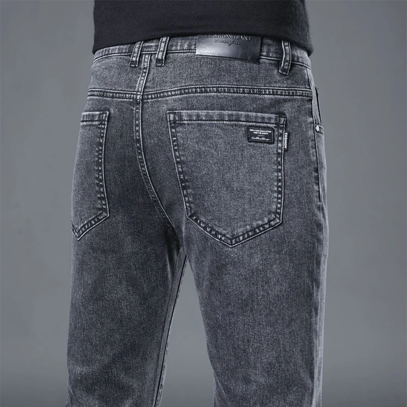 高档广州新塘牛仔裤男款春季2025新款黑色男士修身直筒弹力裤子