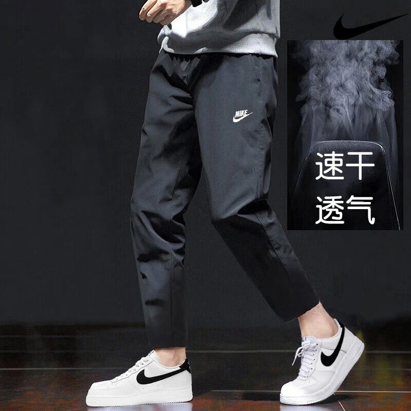NIKE/耐克男子长裤裤子梭织运动裤夏季新款男子宽松男士休闲裤