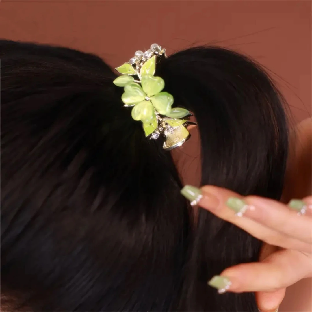 新款猫眼石四叶草水钻抓夹高马尾固定神器385