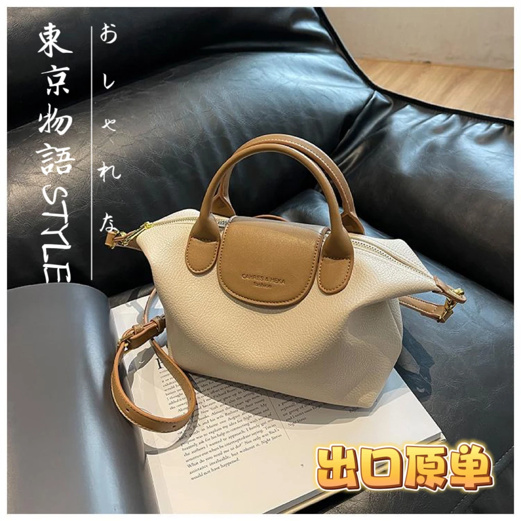 韩版小众设计时尚撞色饺子包2024新款高级感洋气手提包百搭斜挎包