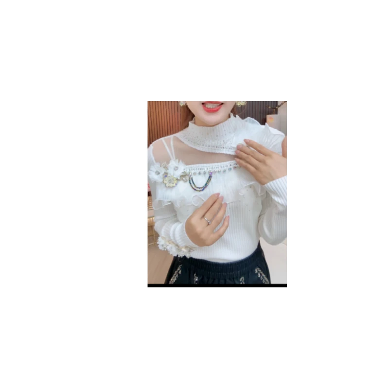 67920紫霞仙子轻奢流苏毛衣