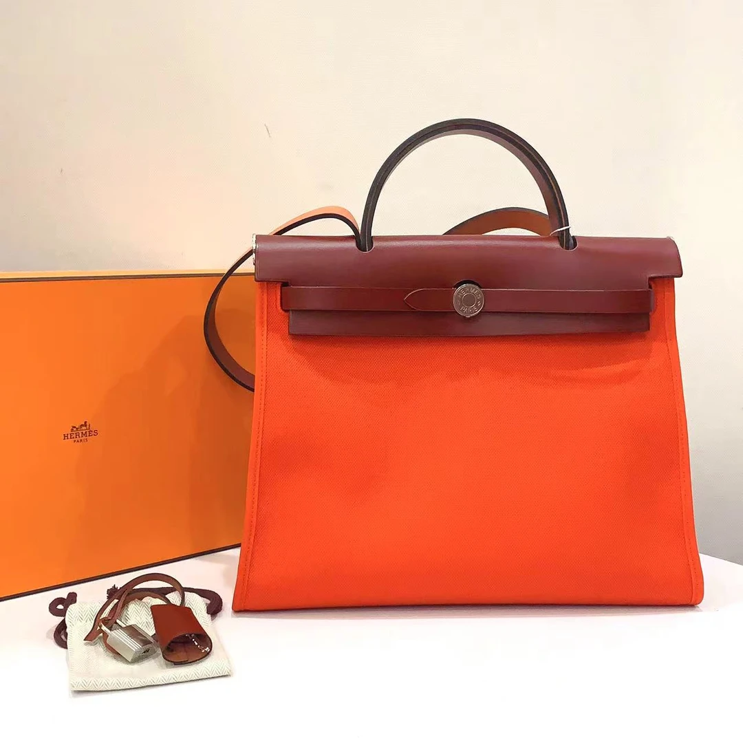 全新未使用 Hermes/爱马仕 蔚蓝/herbag 31 橙拼马鞍后银扣 Y刻