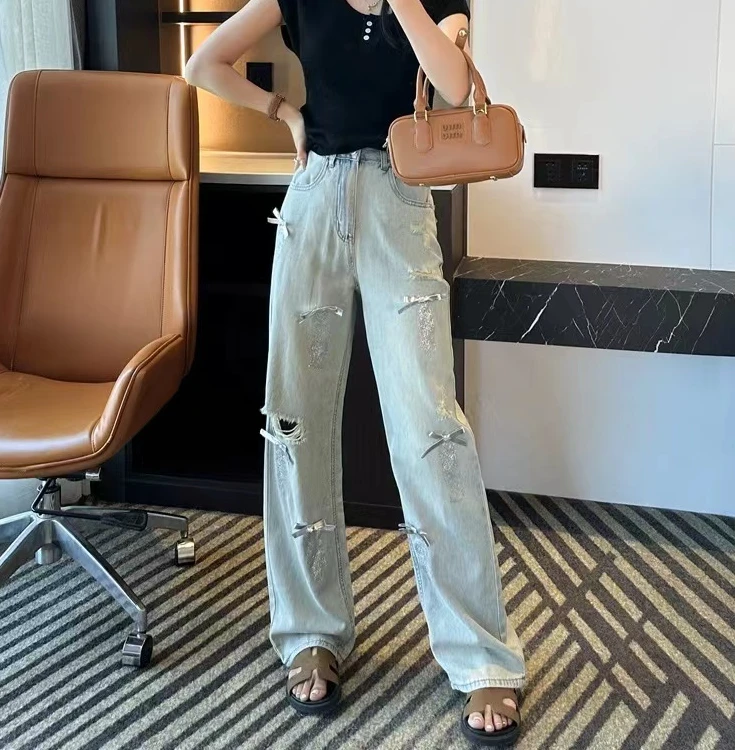 小银蝴蝶牛仔破洞直筒裤