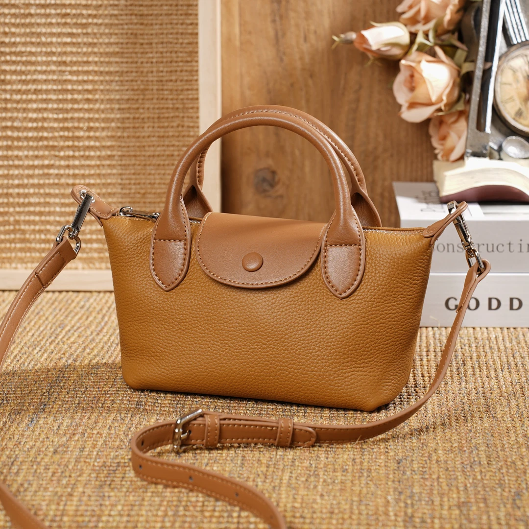 岩牛2024牛时尚休闲饺子包2024新款百搭斜挎包YN3105