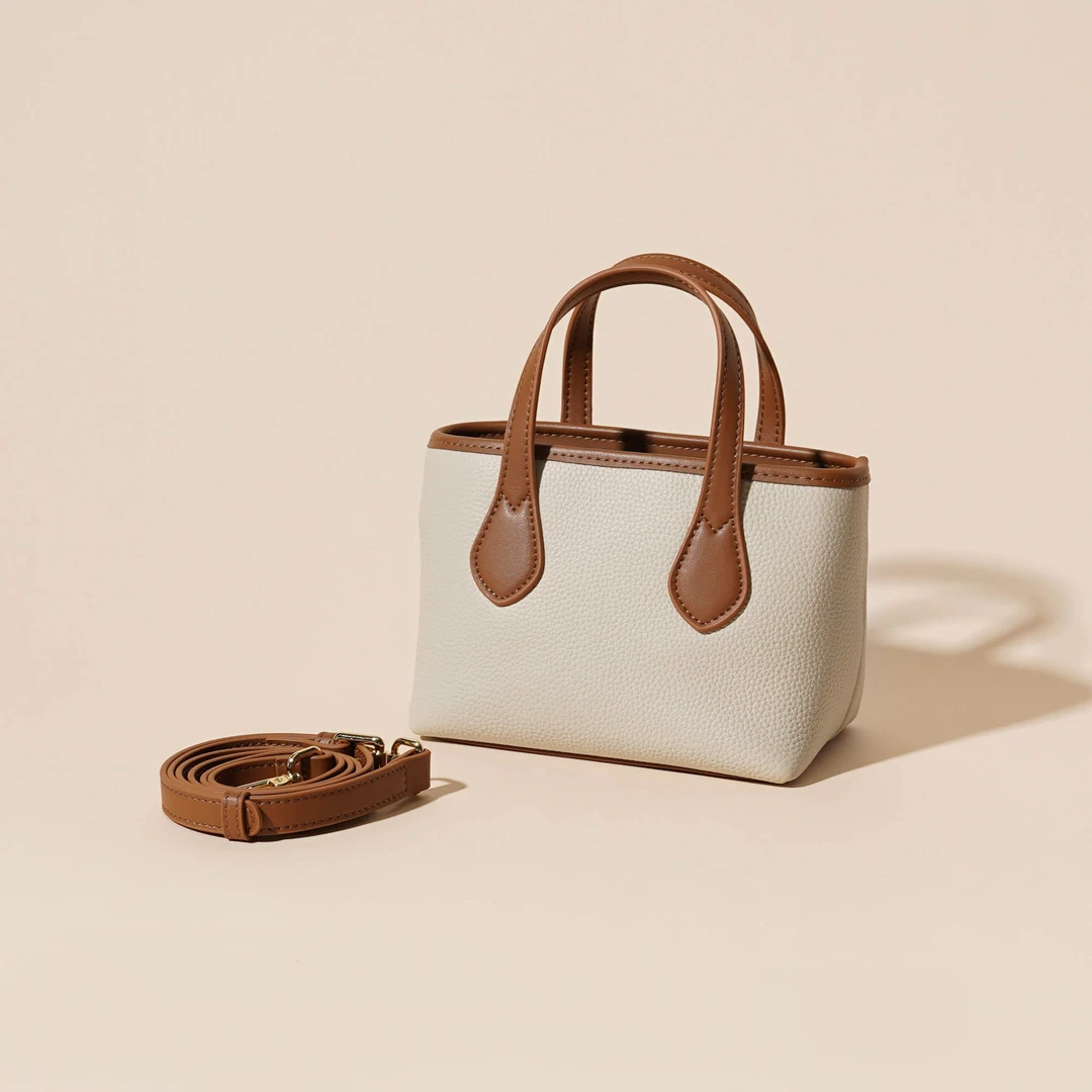 岩牛【苏苏】新款时尚百搭潮流单肩斜挎手提复古小众托特包YN3293