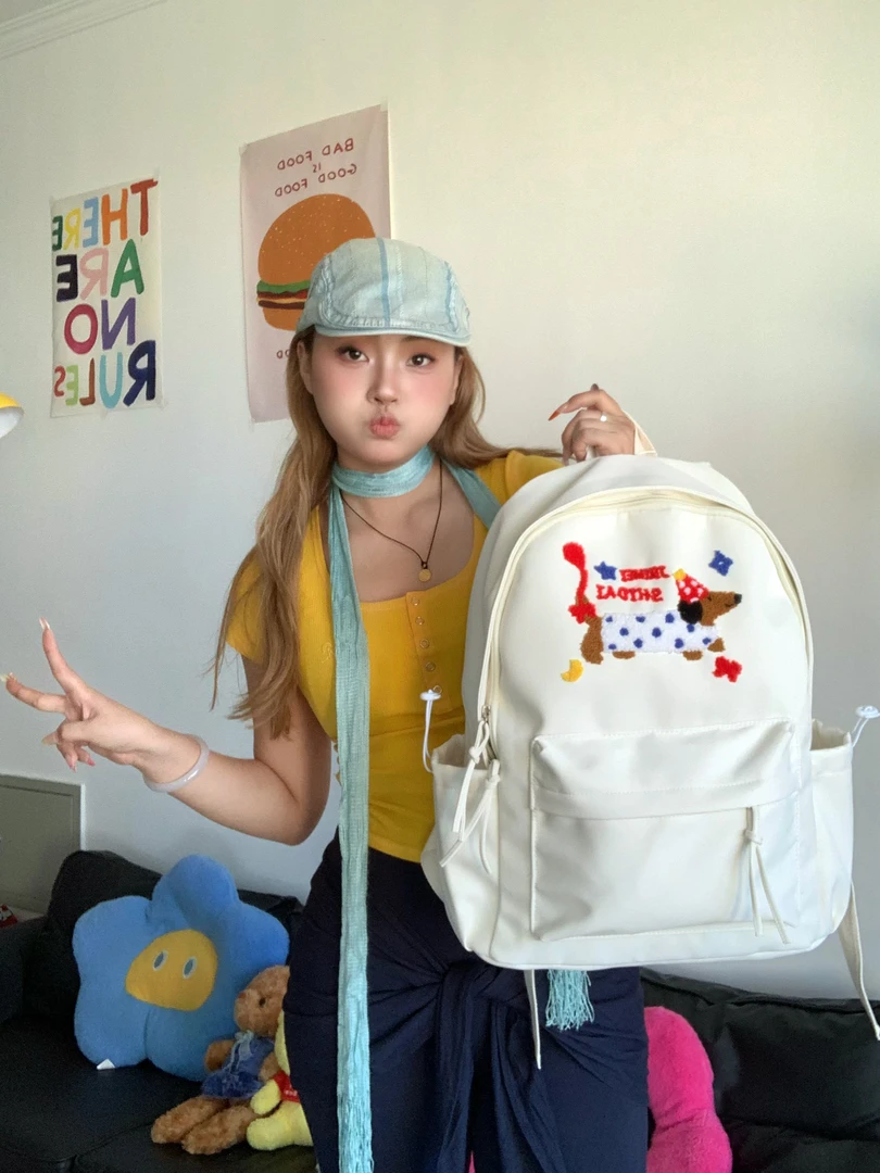 韩版ins可爱腊肠狗百搭双肩包初中生高中生学生大容量休闲书包女