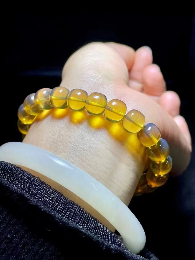 缅甸琥珀老型手串 亮金棕珀体，直径10厚8mm，重10.9克，