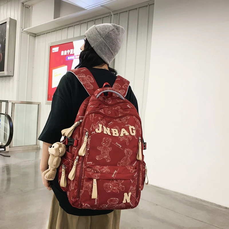 潮酷书包男高中生时尚韩版大容量旅行背包女大学生涂鸦电脑双肩包