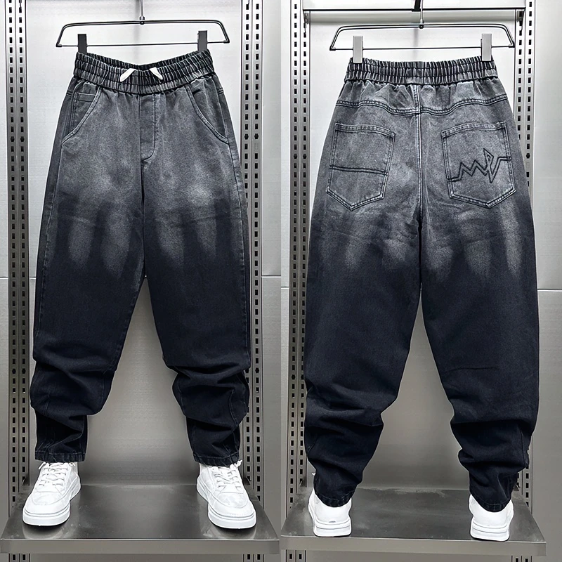 秋季厚款宽松大码痞帅小脚潮牌新款渐变色牛仔裤九分哈伦休闲裤潮