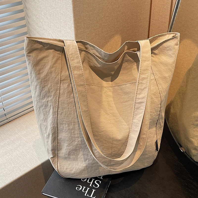 尼龙布托特包包女大容量2025新款高级感质感百搭单肩包上课通勤包