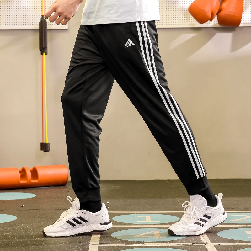 adidas/阿迪达斯新款针织休闲黑色宽松收腿裤运动黑白长裤跆拳道
