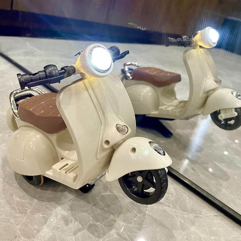 YONGSHUO/永烁电动特技摩托车360度旋转三轮车炫舞音乐儿童玩具车