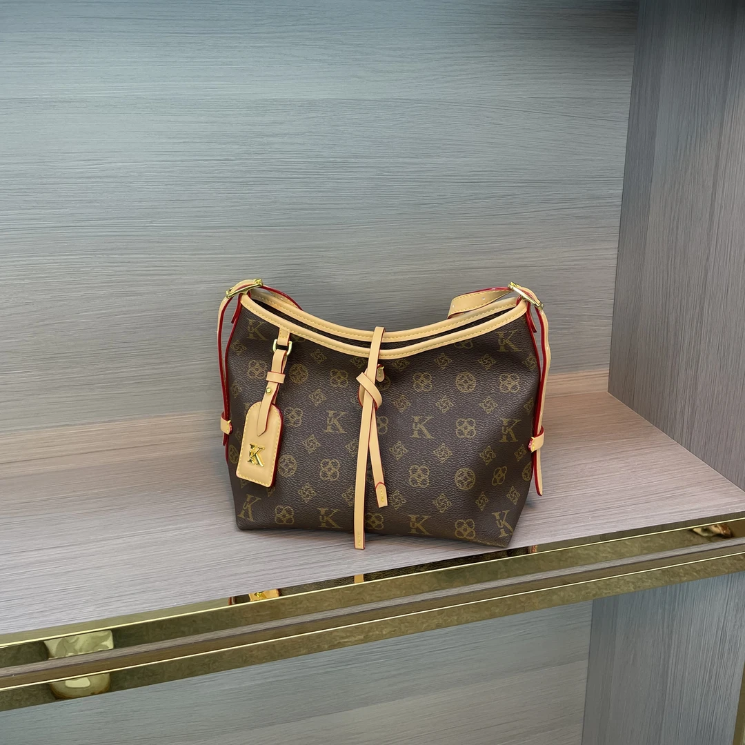 优库迪斯UK爆款大容量机场托特包