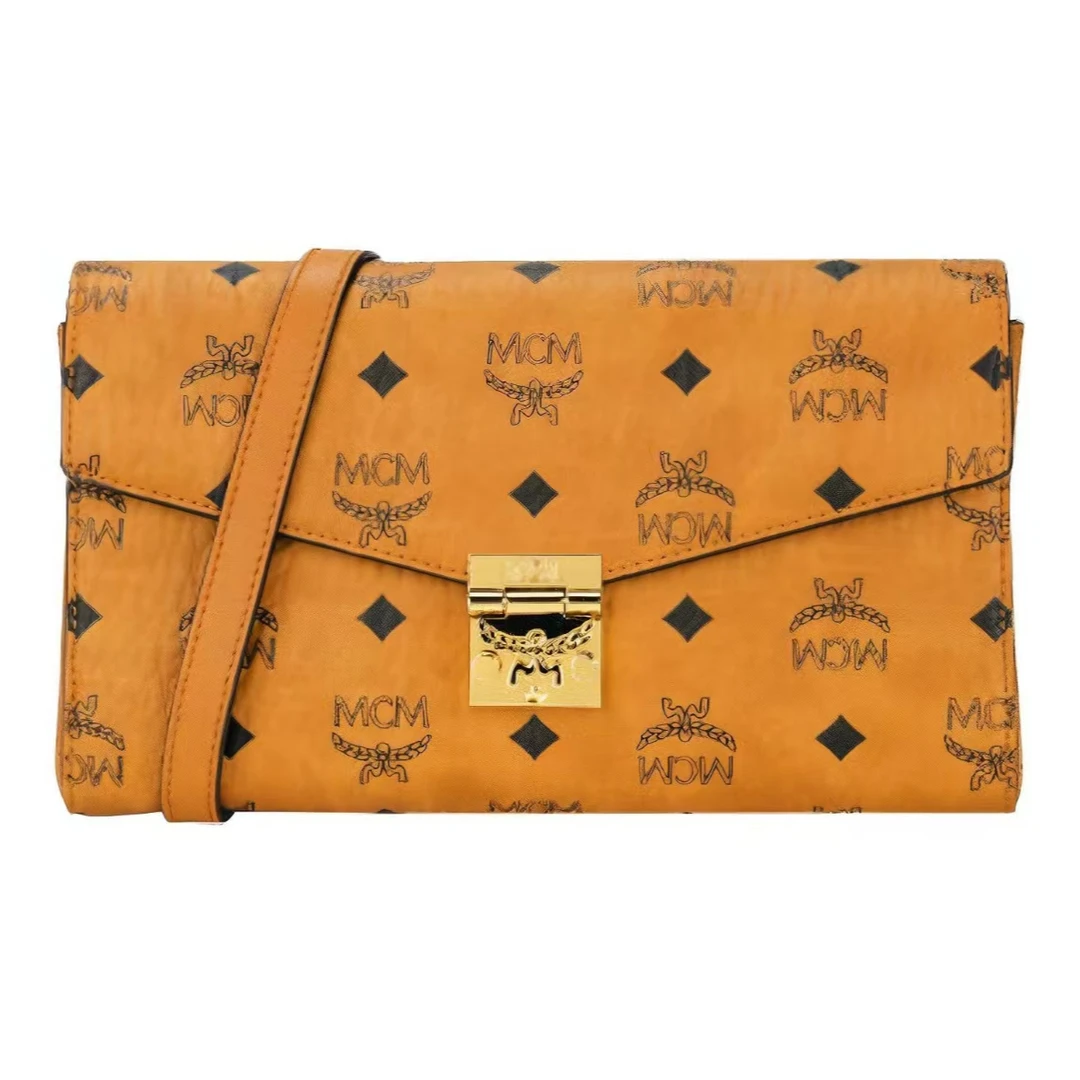 MCM老花满印翻盖开合帆布拼皮革链条包单肩斜挎包中号