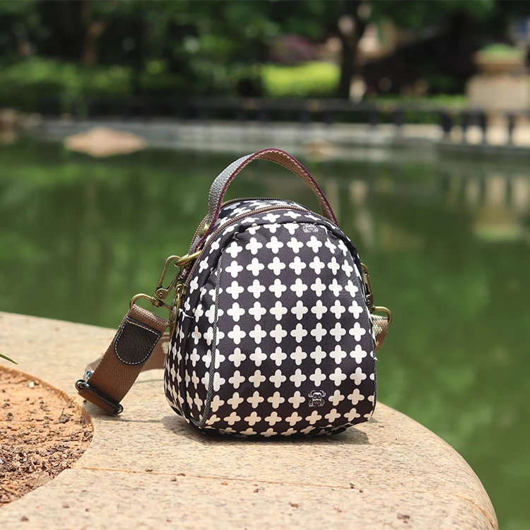 阎双创造手机包潮流单肩斜跨包女士贝壳椭圆形韩版斜挎包小包