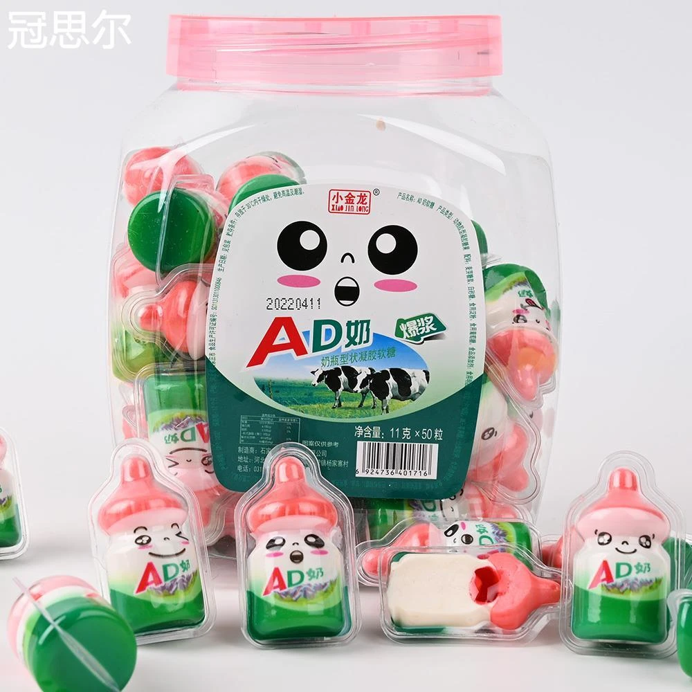 小金龙奶爆浆软糖50个桶装草莓味夹心网红糖果儿童小零食整箱批