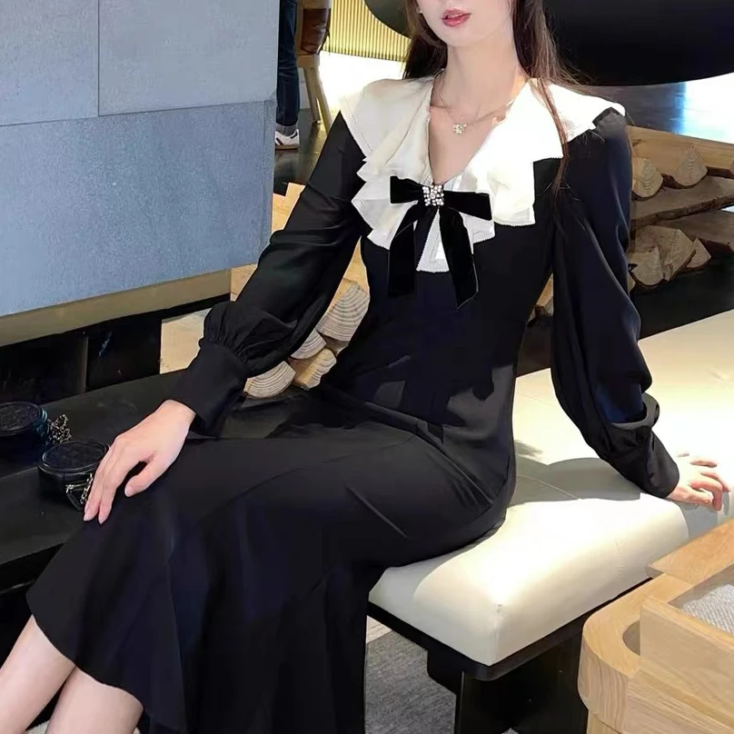 早秋2025年新款法式气质千金荷叶边V领蝴蝶结优雅收腰鱼尾连衣裙