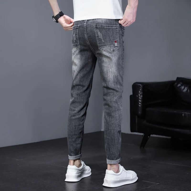 牛仔裤男士春秋季2023年新款潮牌修身小脚九分春装休闲哈伦长裤子