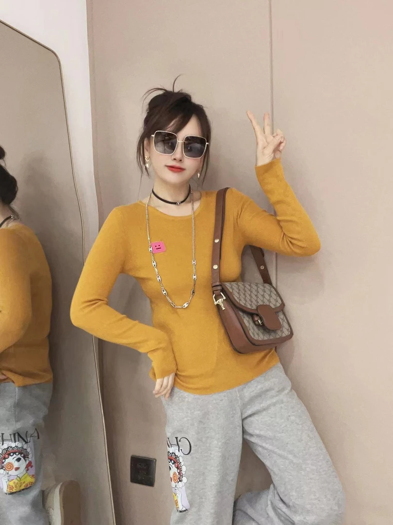 欣雨欣时尚时尚2023新款笑脸针织衫