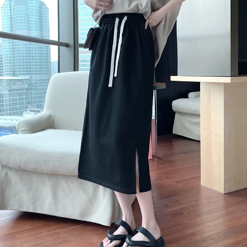 简爱女装清线下119元 韩版遮跨带开叉休闲半身裙 9083