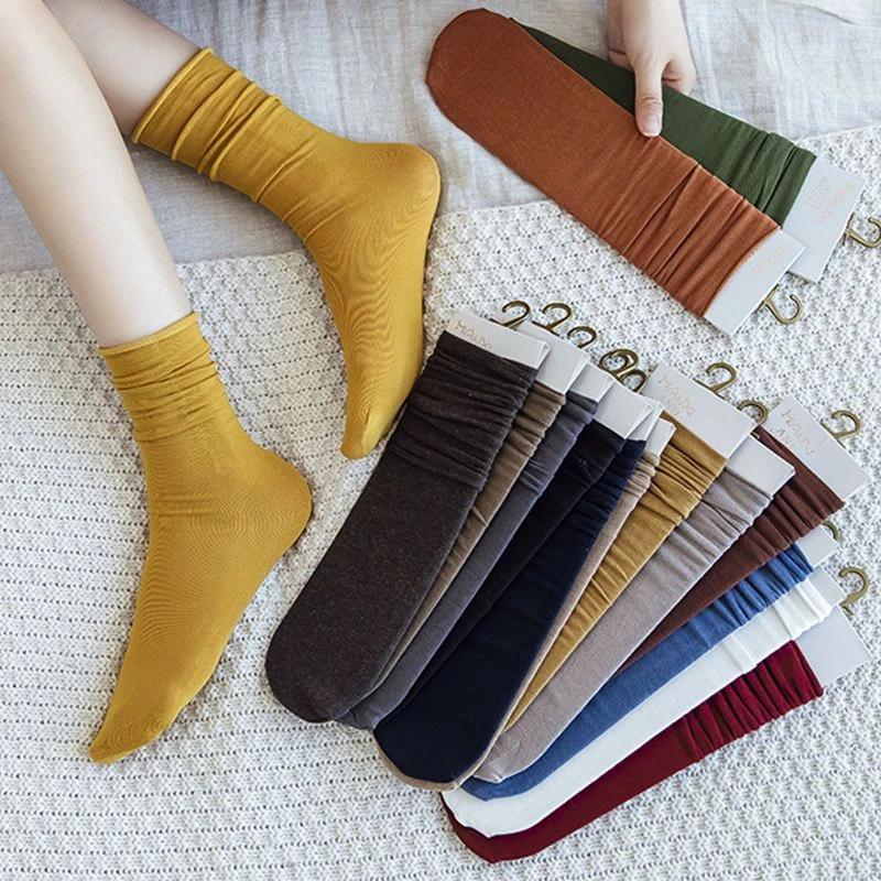 女吸汗棉堆堆袜日系可爱百搭卷边中筒袜黑色无跟纯色袜子长袜女款