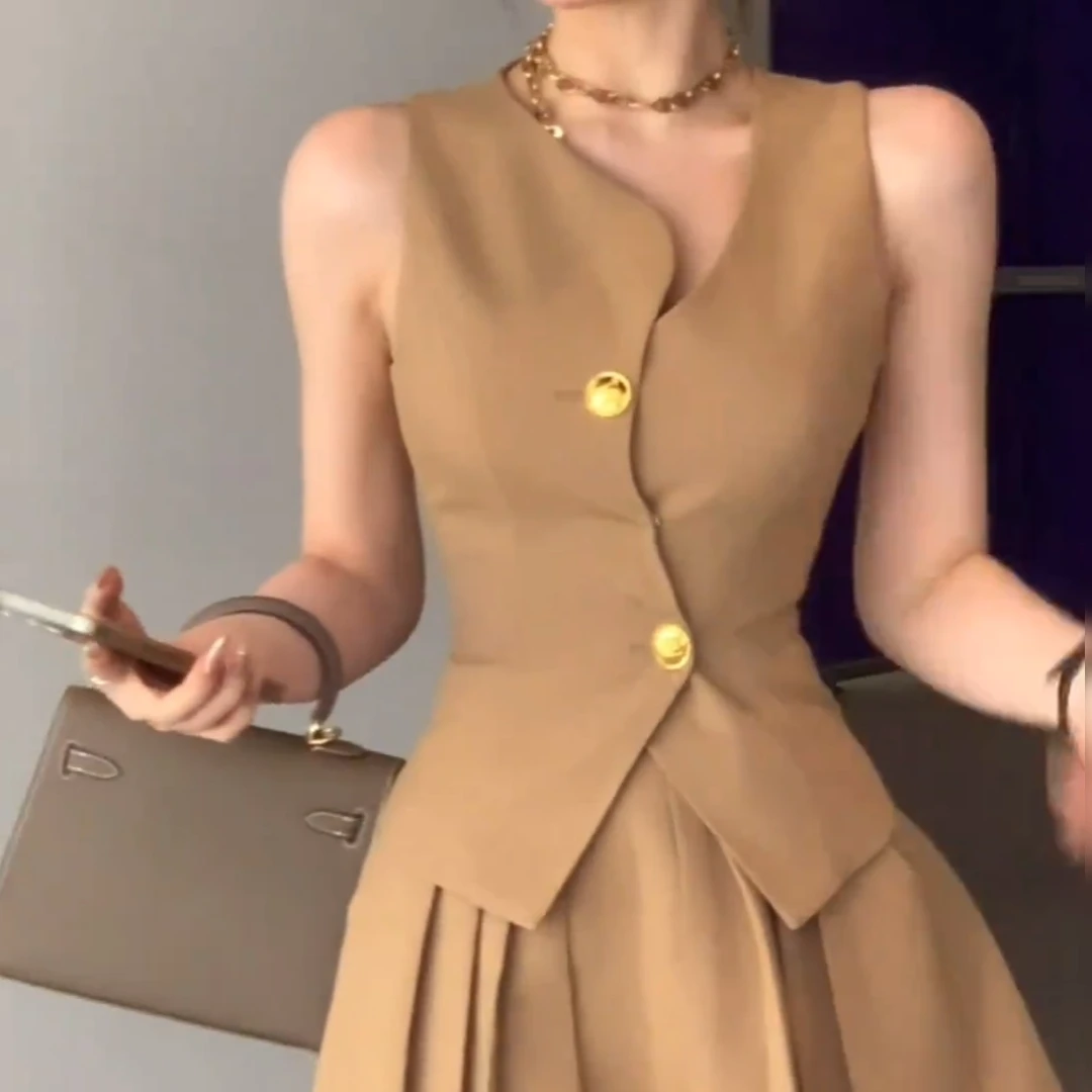 减龄设计感不规则无袖马甲背心+高腰显瘦百褶半身裙短裙两件套女