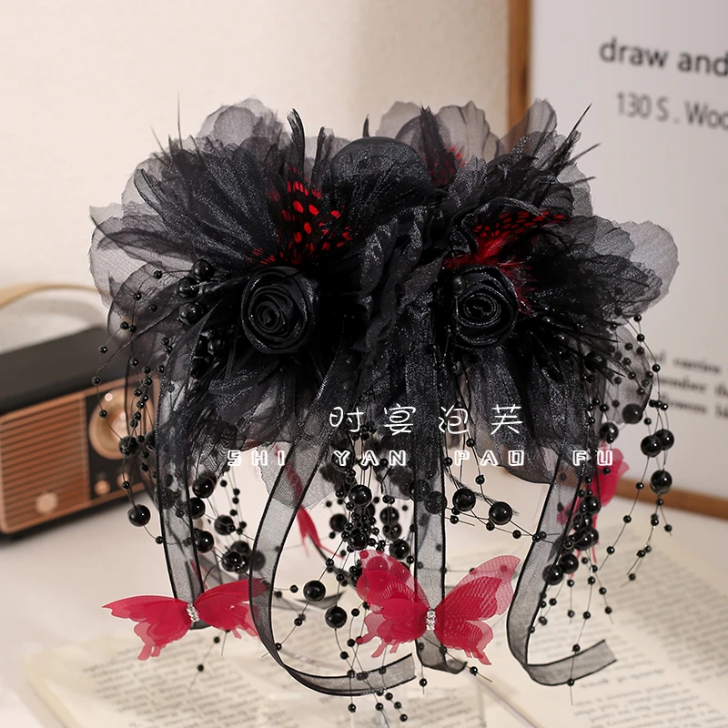 丝带蝴蝶2025原创冬季新款流苏飘带珠珠抓夹高级感复古鲨鱼夹百搭