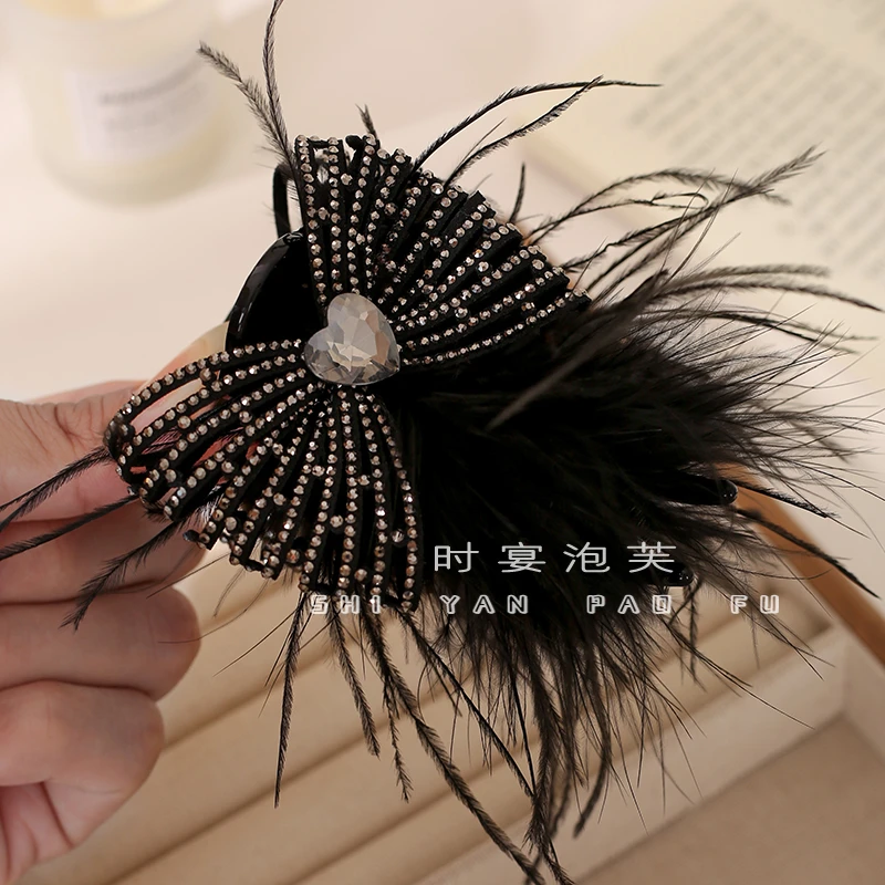 毛毛丸子夹冬季新款蝴蝶结丸子头神器高级感精致发夹显发量收碎发